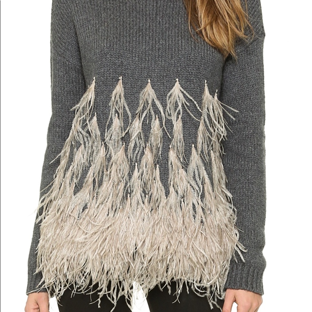 Elizabeth and James sweater